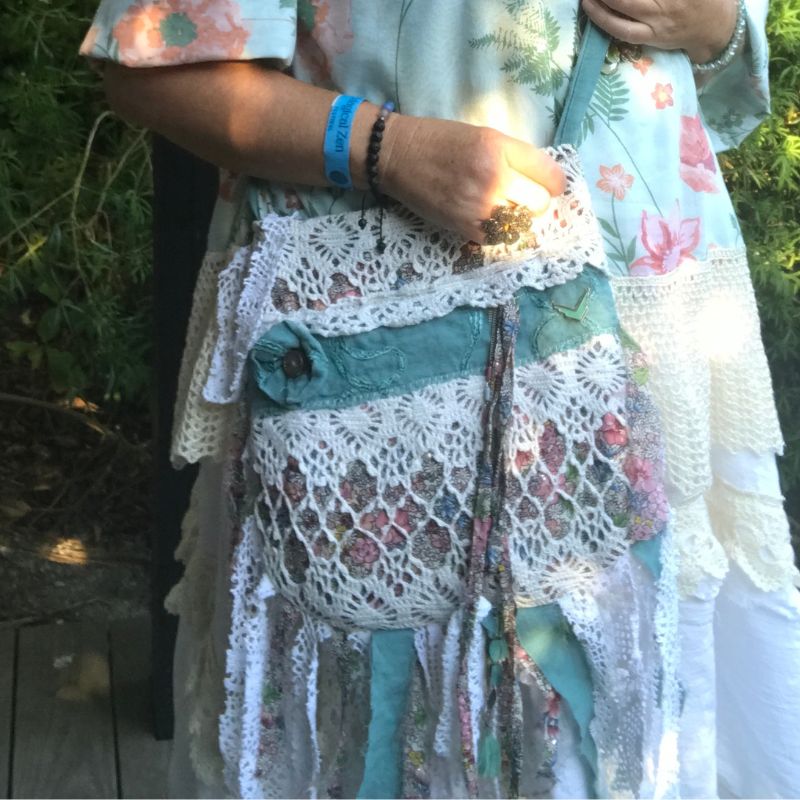 Lace crossbody bag worn at a summer festival
